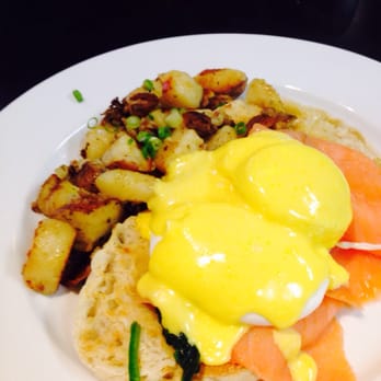 Bella's Cafe - Smoked Salmon Benedict w wilted spinach, home fries and a beautiful hollandaise sauce. - Breakfast & Brunch Near Me - New Haven, Connecticut