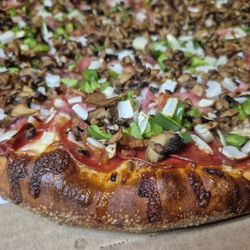 Pizza-Pi - Our Special! Pepperoni, Ham, Bacon, Green Peppers, Onions, Mushrooms and if you like, Anchovies