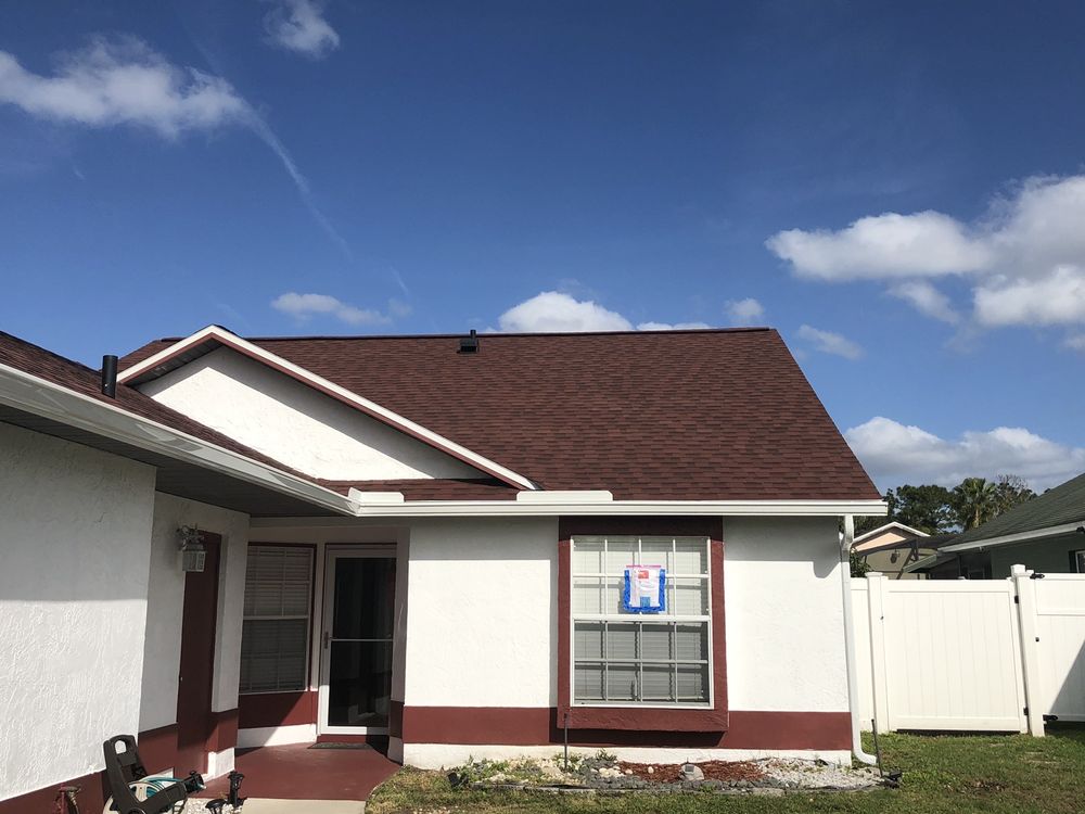 Slide of Tadlock Roofing