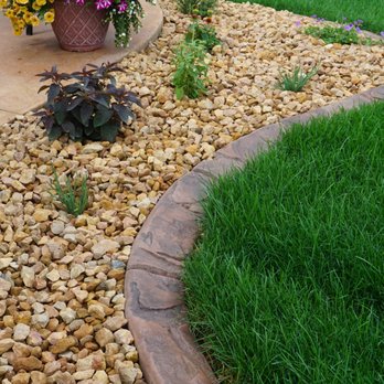 Core Custom Curbing - a gravel path in a backyard - Landscaping Near Me Core Custom Curbing - a gravel path in a backyard - Landscaping Near Me