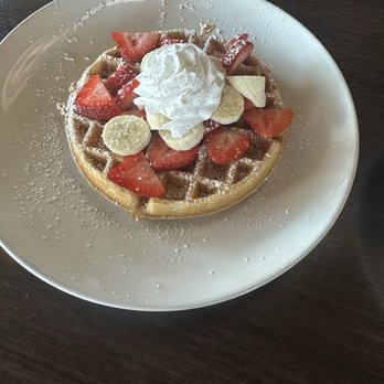 Broken Yolk Cafe - Belgium Waffles with Strawberries, bananas and whipped cream - Breakfast & Brunch Near Me - Spring, Texas
