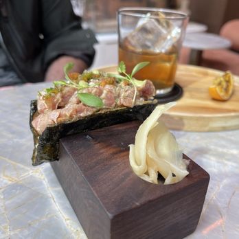 Yama Resto - a person sitting at a table - Desserts Near Me - Montreal, Quebec Yama Resto - a person sitting at a table - Desserts Near Me - Montreal, Quebec