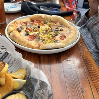 Barnyard Crafthouse & Eatery - The combination pizza was ordered by someone else, but I was given a taste. Delicious! - New American Near Me - Tucson, Arizona