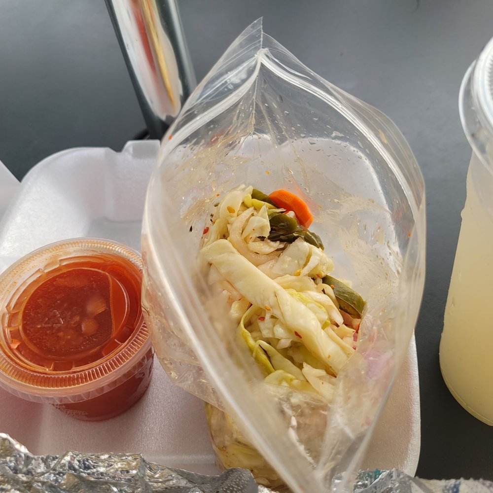 Pupusas Salvadorenas - Hot sauce "broth" was bland. Pickled slaw was nice. Guanabana (soursop) drink on left from the Yelp check-in offer. - Mexican Near Me - Oakland, California Pupusas Salvadorenas - Hot sauce "broth" was bland. Pickled slaw was nice. Guanabana (soursop) drink on left from the Yelp check-in offer. - Mexican Near Me - Oakland, California