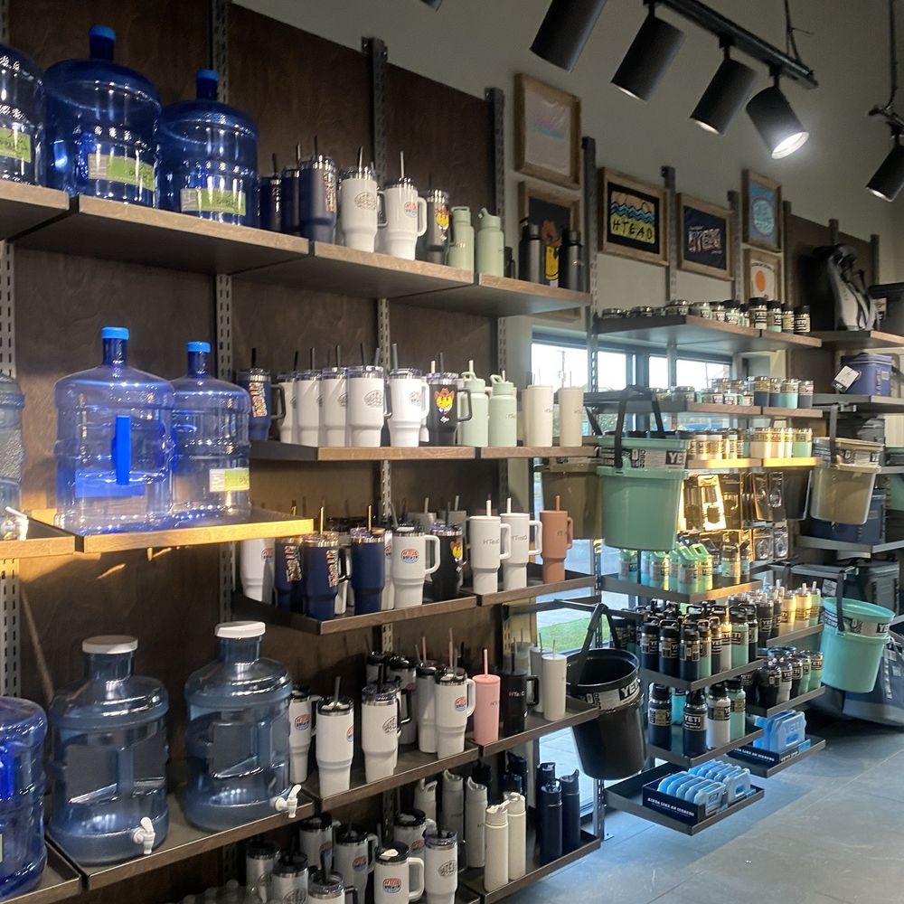 They refill water bottles with purified water They refill water bottles with purified water