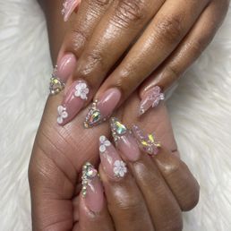 I asked for medium Stiletto nails with a customized style of gems on each finger