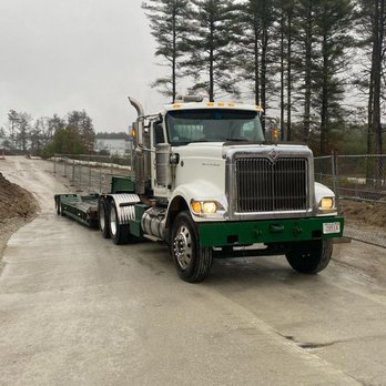 Jones Contracting - a semi truck on a road - Excavation Services Near Me - Walpole, Massachusetts