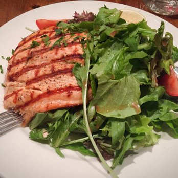 Pisticci - Grilled salmon with mixed green salad. - Italian Near Me - New York, New York Pisticci - Grilled salmon with mixed green salad. - Italian Near Me - New York, New York