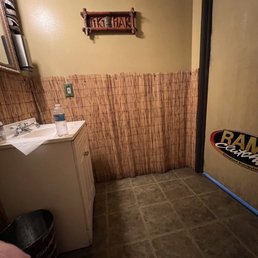 Tiki bar themed bathroom was spotless!