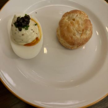 Chez Maggy - Gougere (Cheese bread) and deviled egg with caviar and mayonnaise - French Near Me - Denver, Colorado