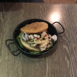 Arepas filled with octopus and conch Arepas filled with octopus and conch