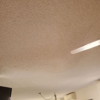 Ohana Restoration - Unmatched ceiling, middle to top area of photo. - Damage Restoration Near Me - Honolulu, Hawaii