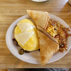 Beckley Omelet Shoppe - Cheese steak Omelet w toast & hash browns.