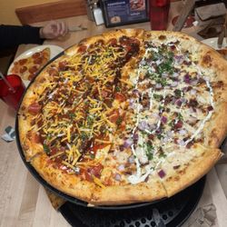Half BBQ Blizzard other half garlic chicken Great crust Great ranch! Pepperoni on bottom that was awesome too!!