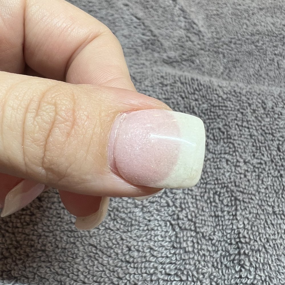 Clear coat coming off the tip and in the middle of my nail