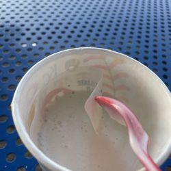 Dairy Queen Store - Haft way through my cake batter cookie dough blizzard and found a wrapper inside with looks like dirt is on it .
