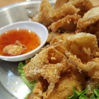 Too Thai Street Eats - Plain chicken skin, have flavor only when dip in sauce - Thai Near Me - Carrollton, Texas Too Thai Street Eats - Plain chicken skin, have flavor only when dip in sauce - Thai Near Me - Carrollton, Texas