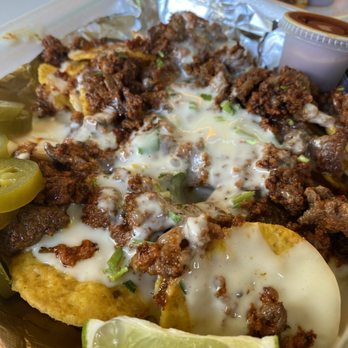 The Rail Yard - Up close of the CHORIZO NACHOS! - Bars Near Me - Little Rock, Arkansas The Rail Yard - Up close of the CHORIZO NACHOS! - Bars Near Me - Little Rock, Arkansas