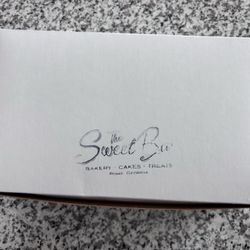 The Sweet Bar - Donut Box stamped with store name.
