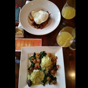 Maya Del Sol - Top to bottom: ropa vieja skillet and salmon benedictos, with a mimosa for each! - Latin American Near Me - Oak Park, Illinois