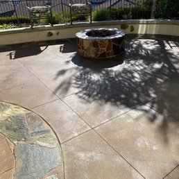 Patio, flagstone and firepit. Sealant almost dry.