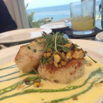 Geoffrey's Malibu - $18 Crab Cakes over sweet corn butter sauce topped with a Pasilla chile and grilled corn relish - Seafood Near Me - Malibu, California Geoffrey's Malibu - $18 Crab Cakes over sweet corn butter sauce topped with a Pasilla chile and grilled corn relish - Seafood Near Me - Malibu, California