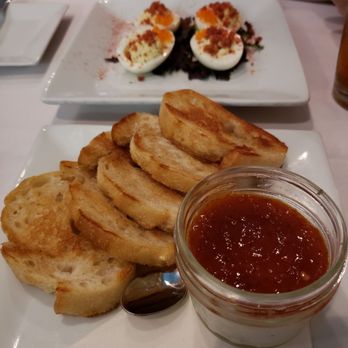 The Noble South - Pepper jelly. It had a delicious cheese spread under the jelly! - New American Near Me - Mobile, Alabama The Noble South - Pepper jelly. It had a delicious cheese spread under the jelly! - New American Near Me - Mobile, Alabama