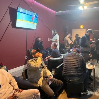 Executive Cigar Club - a group of people sitting in a lounge area - Cigar Bars Near Me - Westville, New Jersey Executive Cigar Club - a group of people sitting in a lounge area - Cigar Bars Near Me - Westville, New Jersey