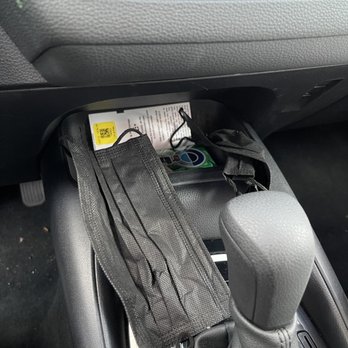 Hertz Rent A Car - Literally someones used masks and gum and receipts. - Car Rental Near Me - Seattle, Washington