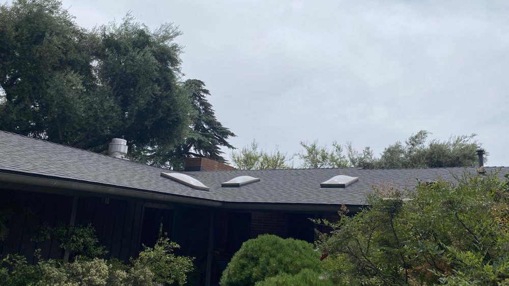 Slide of RJC Roofing