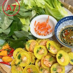 Pho Hanoi 89 - Bánh khọt: crispy Vietnamese mini pancakes with shrimp, coconut, and scallions. Served with fresh greens and tangy dipping sauce. A must-try