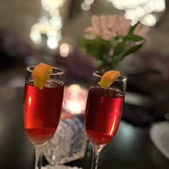 The Glitz - two glasses of wine on a table - New American Near Me - Versailles, Kentucky
