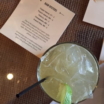 Lento Restaurant - Their special drink of the night, a kiwi infused drink mixed with light and dark rum and kiwi syrup to solidify the flavour - New American Near Me - Rochester, New York