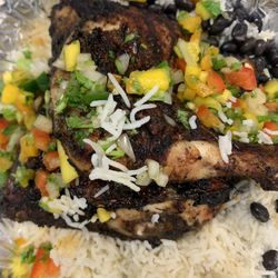 New Harvest Cafe & Grill - Jerk chicken over basmati rice. Simply amazing!!!
