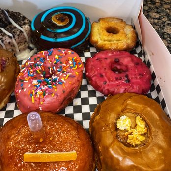Wicked Donuts - Dozen Donuts:Creme Brûlée filling, Homer Simpson, banana and peanut butter, glazed, blueberry, caramel filling - Donuts Near Me - Las Vegas, Nevada Wicked Donuts - Dozen Donuts:Creme Brûlée filling, Homer Simpson, banana and peanut butter, glazed, blueberry, caramel filling - Donuts Near Me - Las Vegas, Nevada