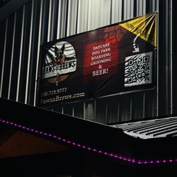 Paws & Brews - The sign for information and QR code