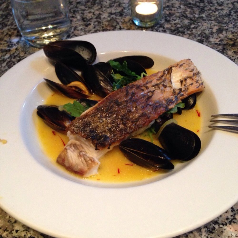 Petit Valentien - Sea bass with saffron soup. Delish!!! - French Near Me - Santa Barbara, California