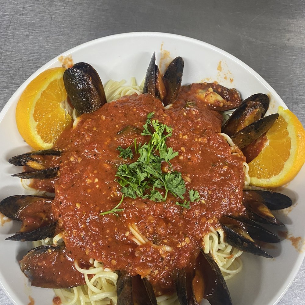 Diamond Grill Restaurant - a plate of spaghetti with musselling and sauce - Diners Near Me - Salem, New Jersey Diamond Grill Restaurant - a plate of spaghetti with musselling and sauce - Diners Near Me - Salem, New Jersey