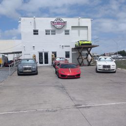 Exterior outside entrance of The New Auto Toy Store - The front of the dealership! - Pompano Beach, Florida Exterior outside entrance of The New Auto Toy Store - The front of the dealership! - Pompano Beach, Florida