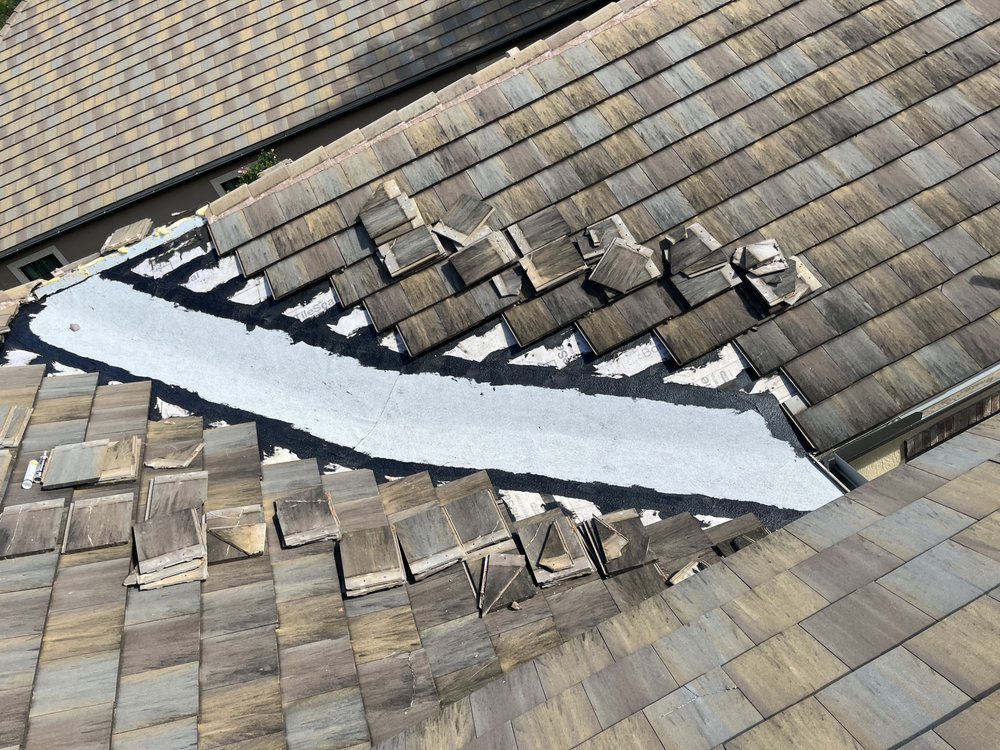 Slide of Francis Roofing Solutions