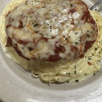 Mamma Mias - Eggplant parmigiana with angel hair and Alfredo sauce - Italian Near Me - Seymour, Tennessee Mamma Mias - Eggplant parmigiana with angel hair and Alfredo sauce - Italian Near Me - Seymour, Tennessee