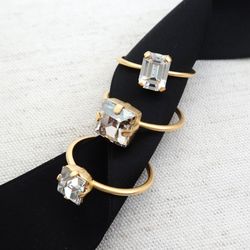 Perfect Details - Minimal jewelry. Tiny crystal rings on thin gold bands. La Vie Parisienne Collection designed by Catherine Popesco.
