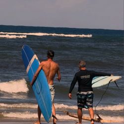 Hanalei Surf School - About to catch some waves.