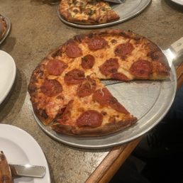 Pizza and baked potato. Pizza and baked potato.