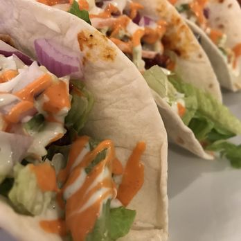 Bonchon Costa Mesa - Spicy chicken tacos (3). Be wary of spice on the bottom of the taco, it's more spicy than the wings! - Chicken Wings Near Me - Costa Mesa, California