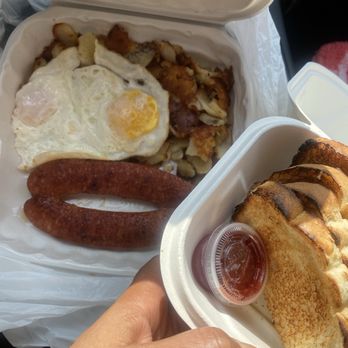 Country Kitchen - Portuguese sausage, two over medium eggs, country-style hash browns; buttered sourdough bread slices served w/a side of strawberry jelly. - Breakfast & Brunch Near Me - Long Beach, California Country Kitchen - Portuguese sausage, two over medium eggs, country-style hash browns; buttered sourdough bread slices served w/a side of strawberry jelly. - Breakfast & Brunch Near Me - Long Beach, California