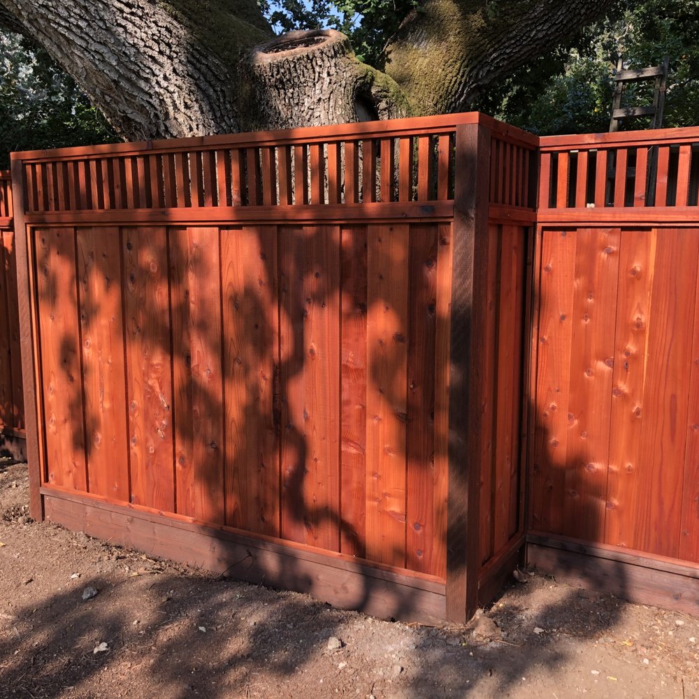 FenceMaster - They boxed the oak tree to give it room. The old fence was not boxed. - Fences & Gates Near Me - San Carlos, California FenceMaster - They boxed the oak tree to give it room. The old fence was not boxed. - Fences & Gates Near Me - San Carlos, California