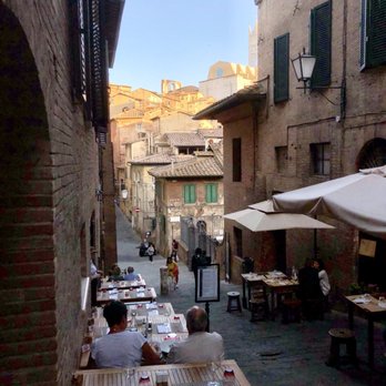 Zest - What a view! Zest tables on the left, most with a great view of the Duomo. - Italian Near Me - Siena, SI