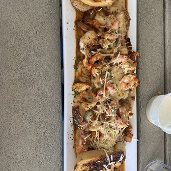 McElroy's Harbor House - Crab cakes with crawfish & shrimp cream sauce - Seafood Near Me - Biloxi, Mississippi McElroy's Harbor House - Crab cakes with crawfish & shrimp cream sauce - Seafood Near Me - Biloxi, Mississippi