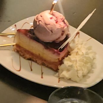 AJ Chocolate House - Fruitcake with strawberry ice cream - Chocolatiers & Shops Near Me - Winter Park, Florida